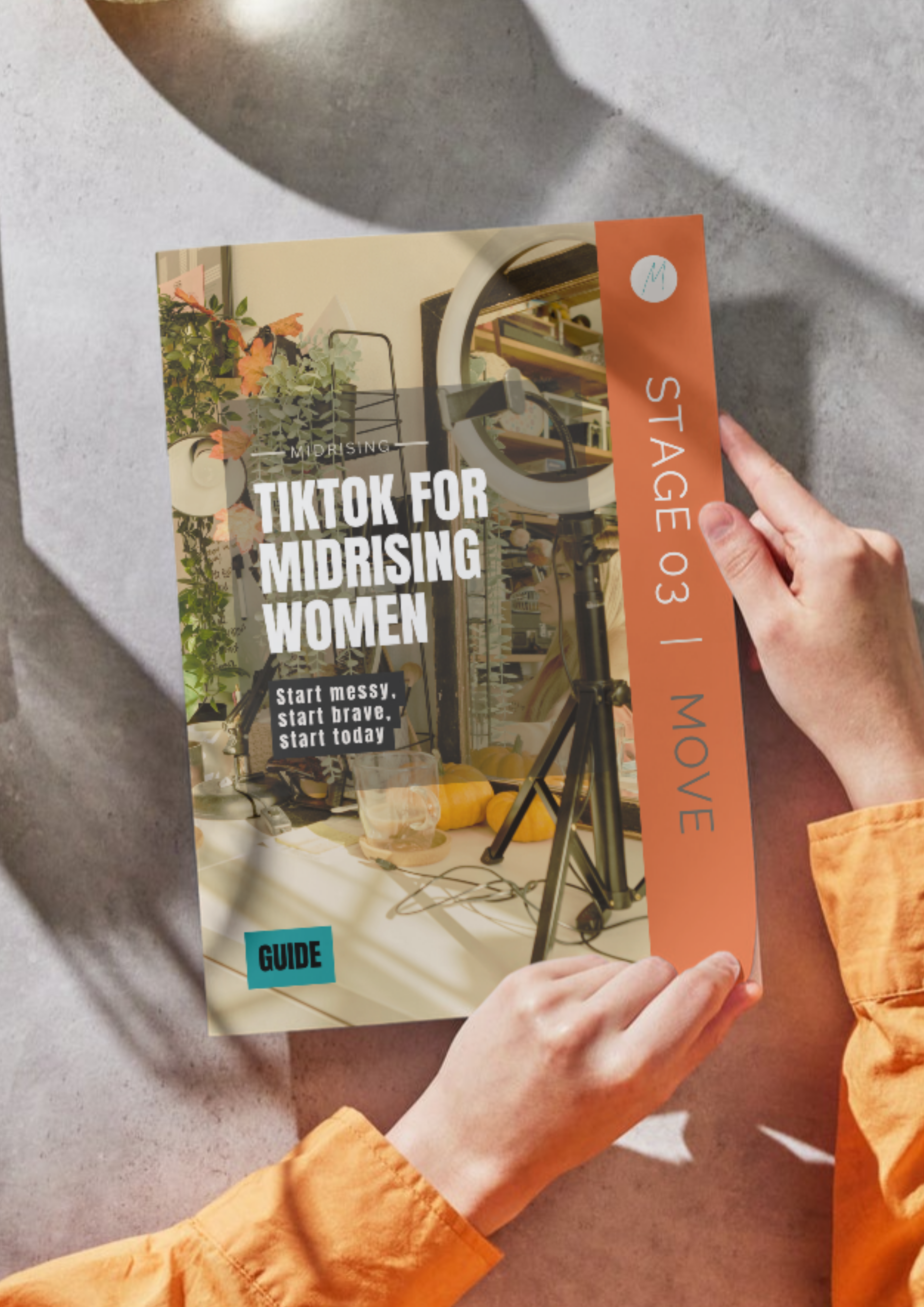 TikTok for Midrising Women ebook held in hand — a practical TikTok guide for Gen X women in midlife. Stage 03 Move.