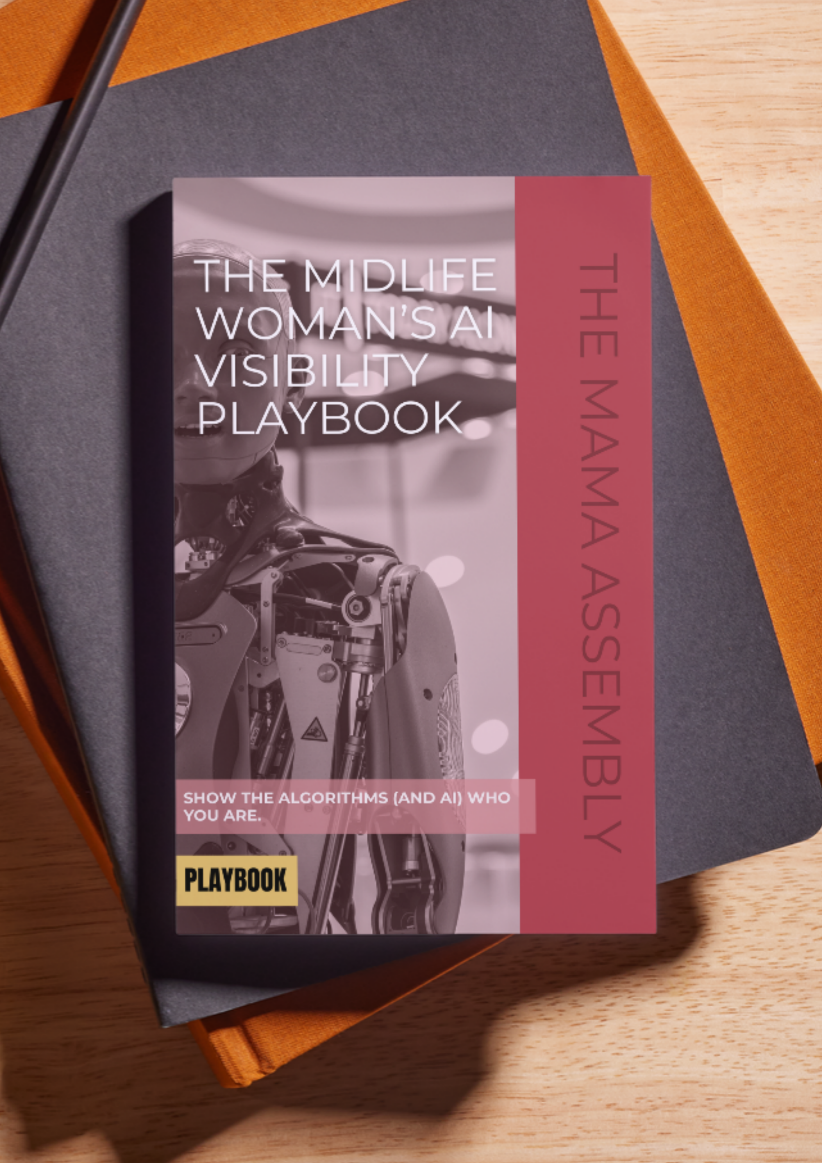 Book titled 'The Midlife Woman's AI Visibility Playbook' by The Mama Assembly on a textured surface.